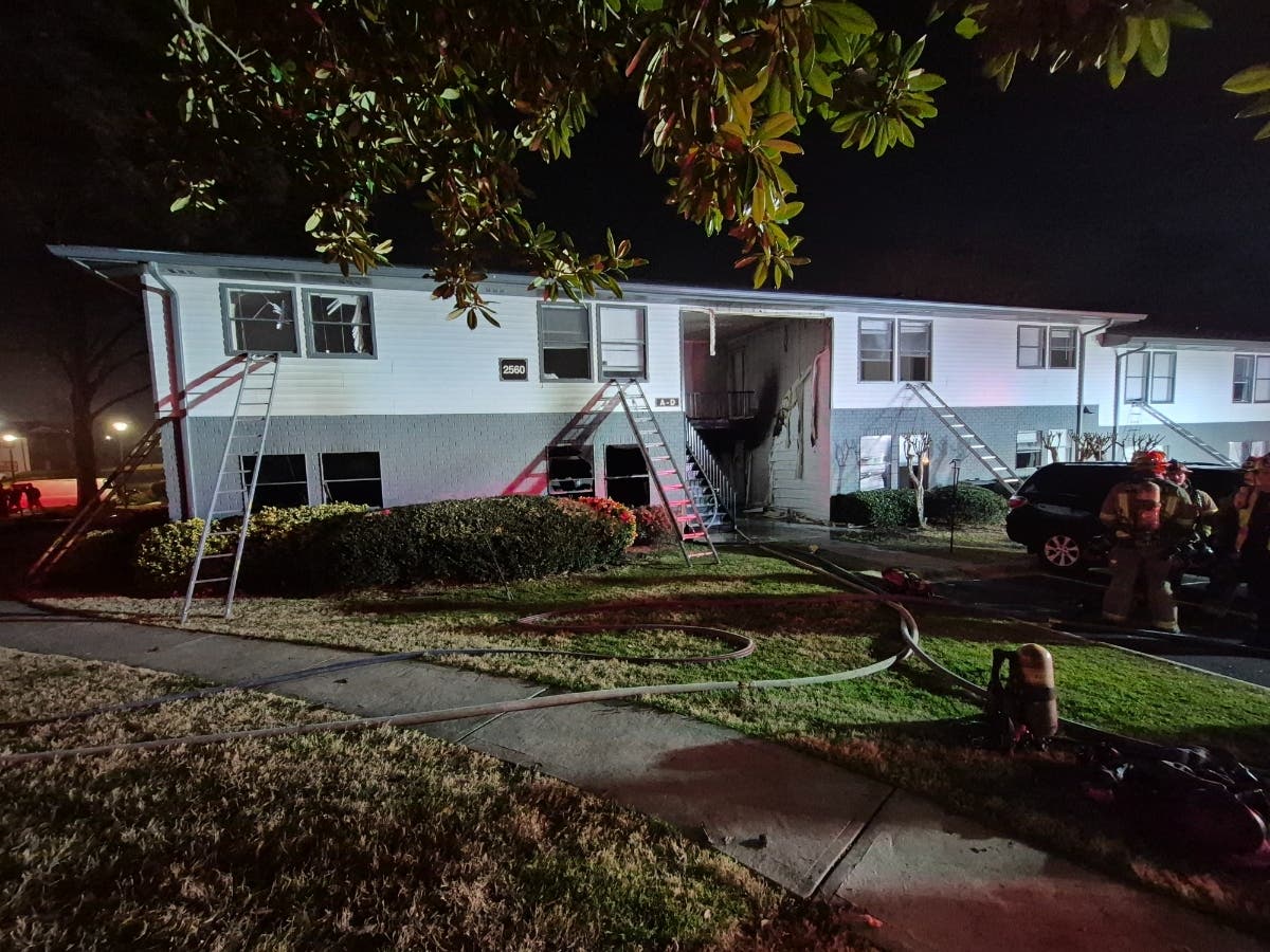 Gwinnett County firefighters respond to a fire around 10:15 p.m. Wednesday in the 2600 block of Windsor Woods Lane.