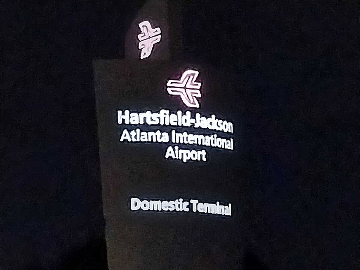 Travelers are waiting nearly 40 minutes in security lines Monday at the Hartsfield-Jackson Atlanta International Airport due to a combination of severe weather and a partial government shutdown.