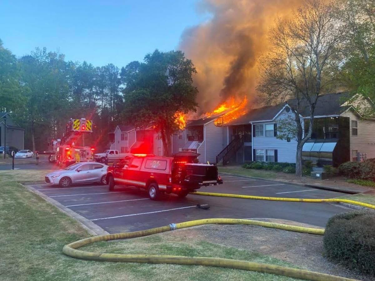 A fire erupts around 7:30 p.m. Thursday at the Enclave apartment complex in the 11000 block of Alpharetta Highway, causing 62 people to be displaced.