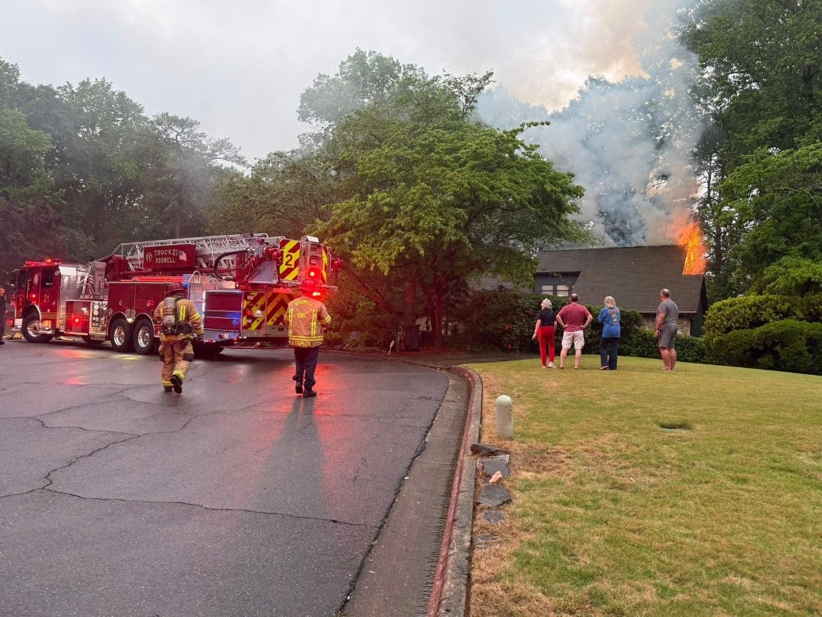 The Roswell Fire Department responds to a house fire around 7:45 p.m. Wednesday at River Close.