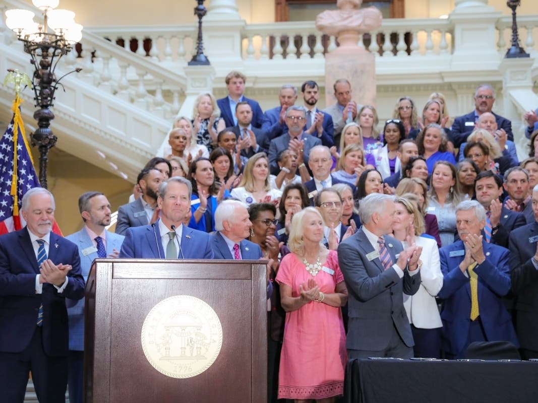 Gov. Brian Kemp on Tuesday signs nine pieces of legislation he says backs literacy and K-12 education. The bill signing took place on the North Wing steps of the Georgia State Capitol in Atlanta.
