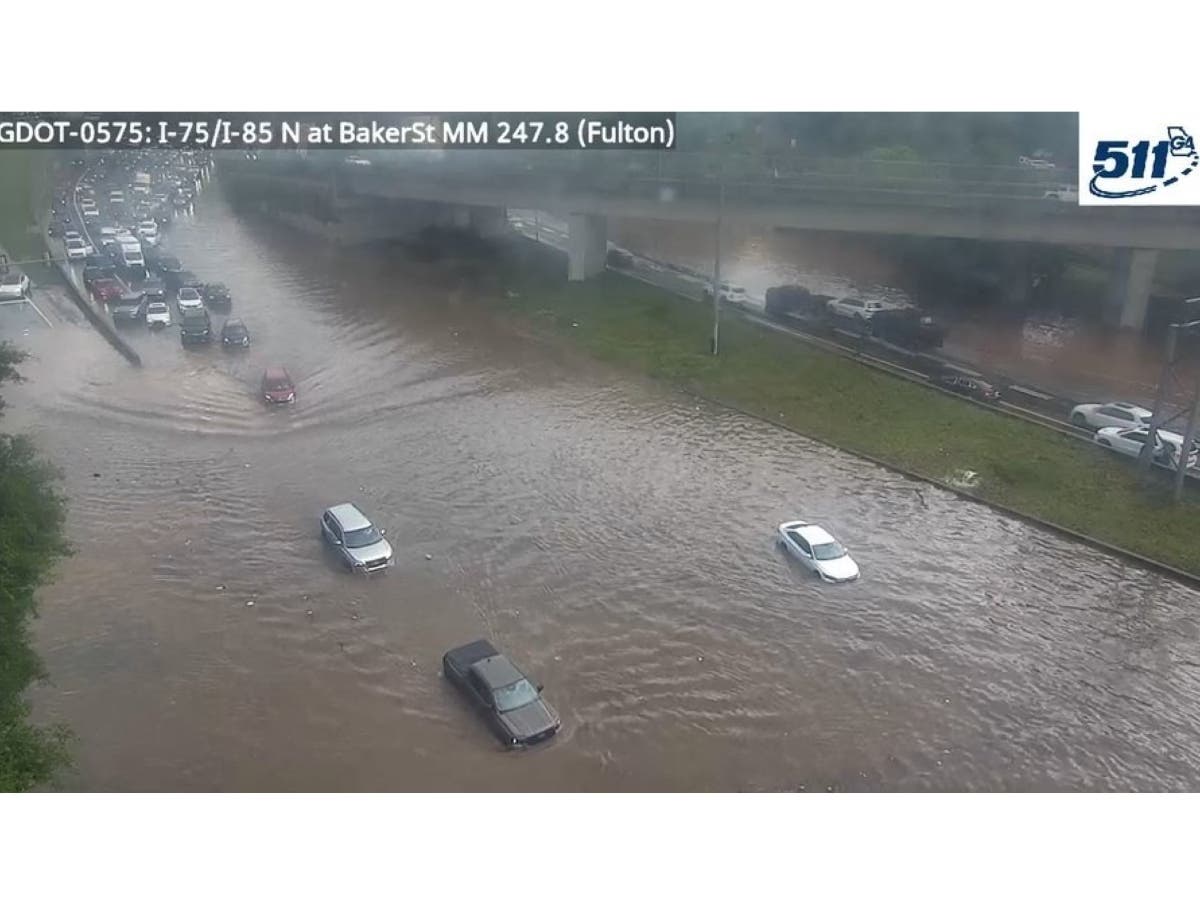 I-75/85 north at Baker Street floods Wednesday in Atlanta due to heavy rain. All lanes on I-75/85 north and south at JW Dobbs Avenue were blocked due to flooding.