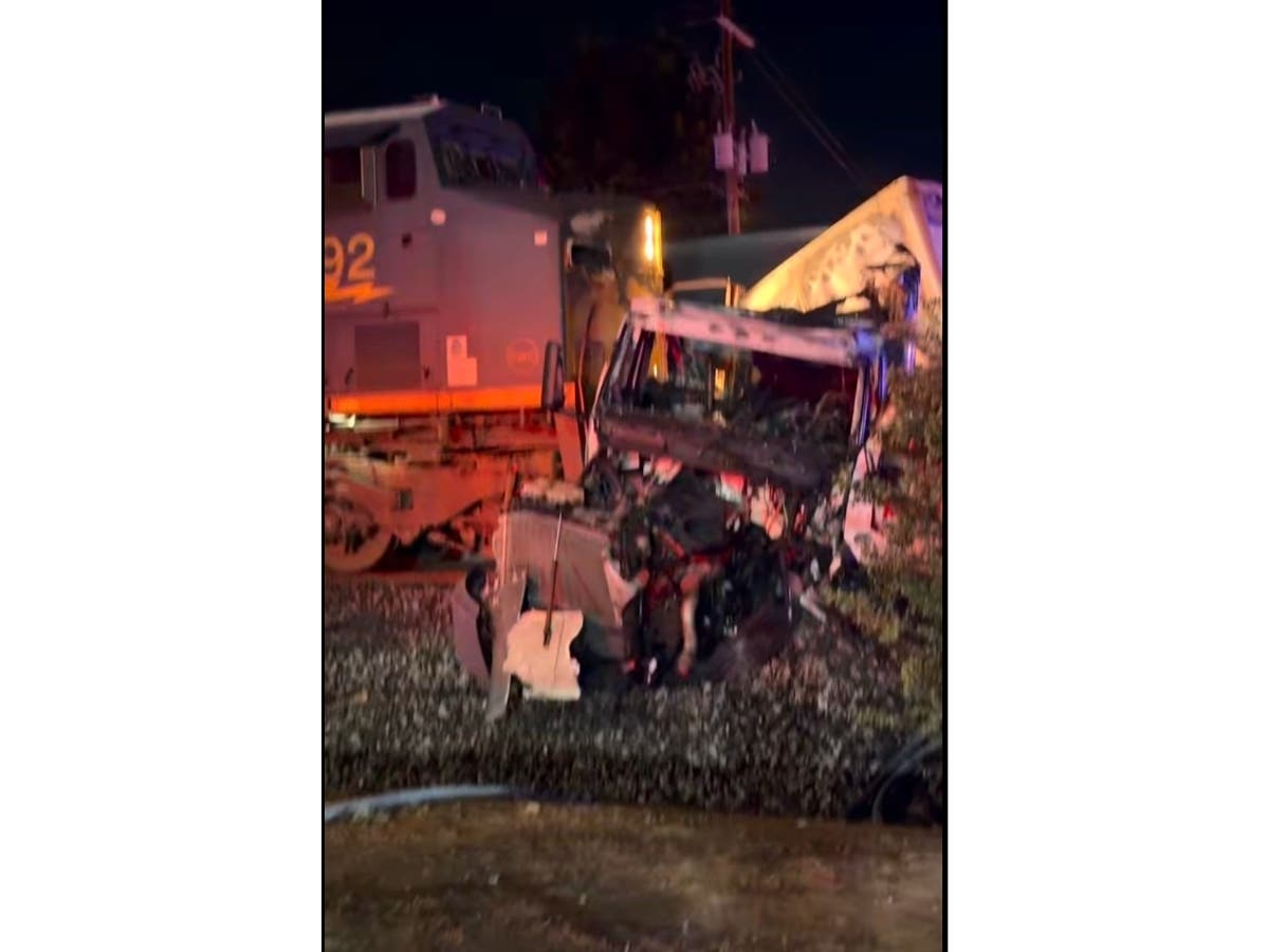 A train crashes into a tractor-trailer around 3:45 a.m. Friday in the area of Lee and Sparks streets in Atlanta. 