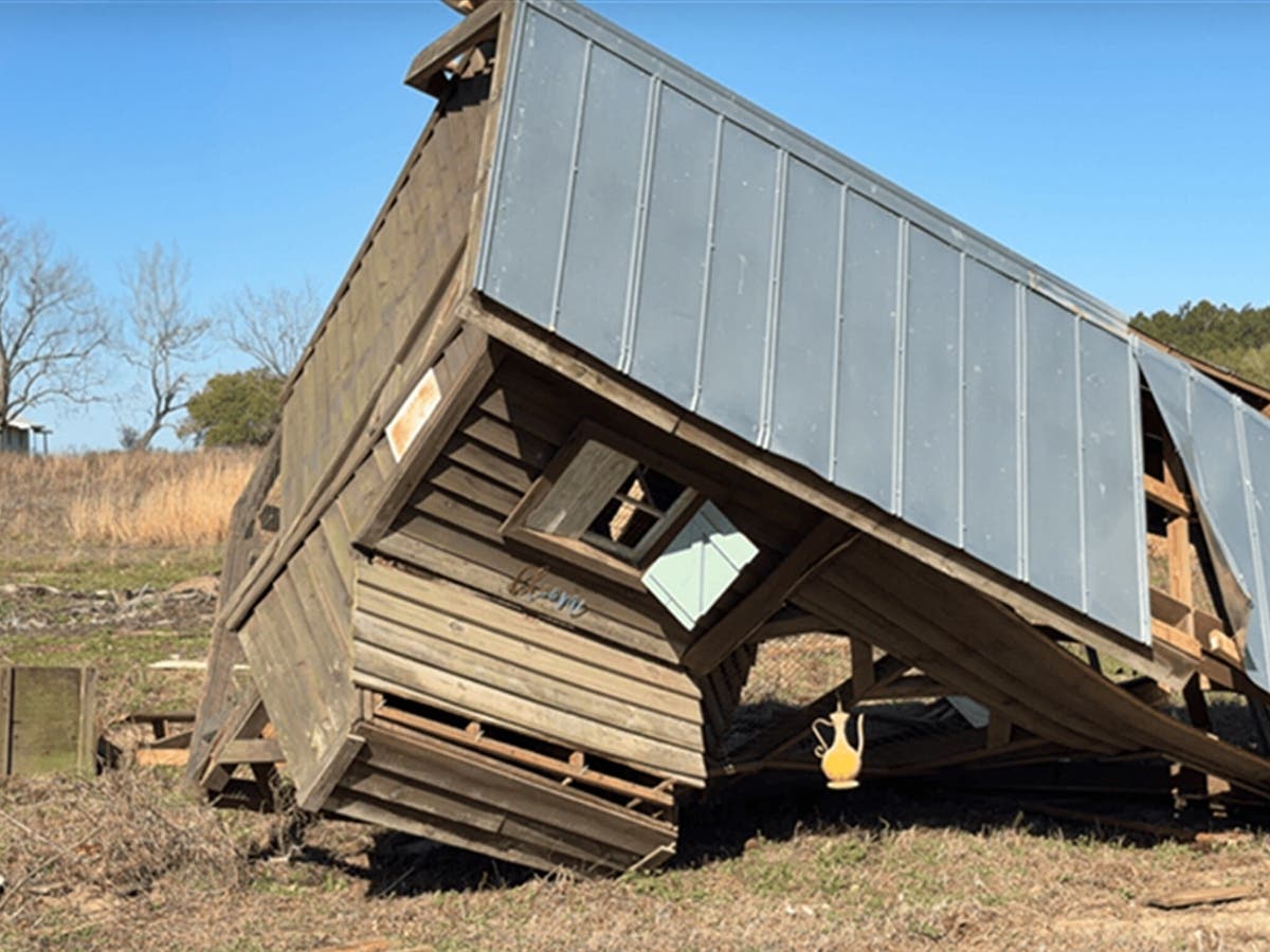 A home is dismantled after a tornado on March 12 in Georgia.