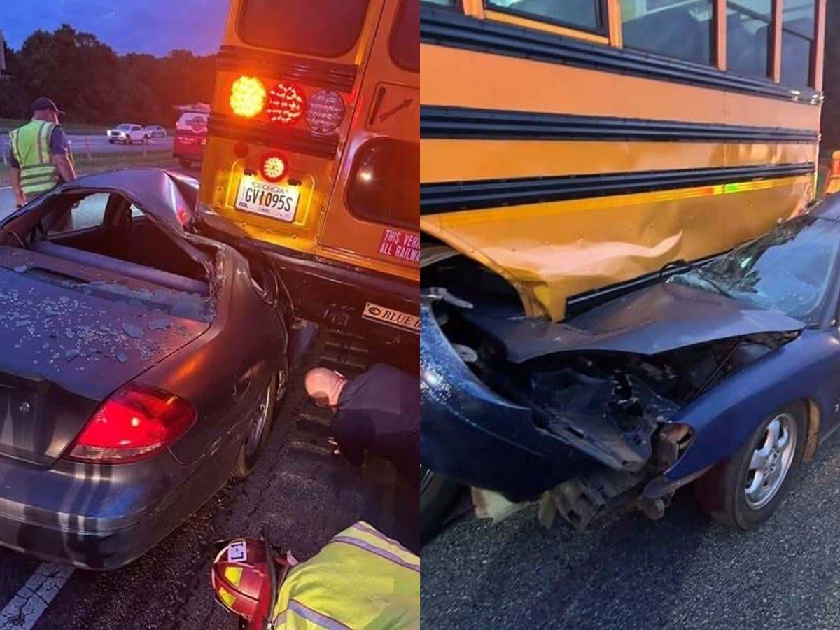 A car becomes lodged under a school bus during a crash Thursday morning at Athens Perimeter near the Jefferson Road exit.
