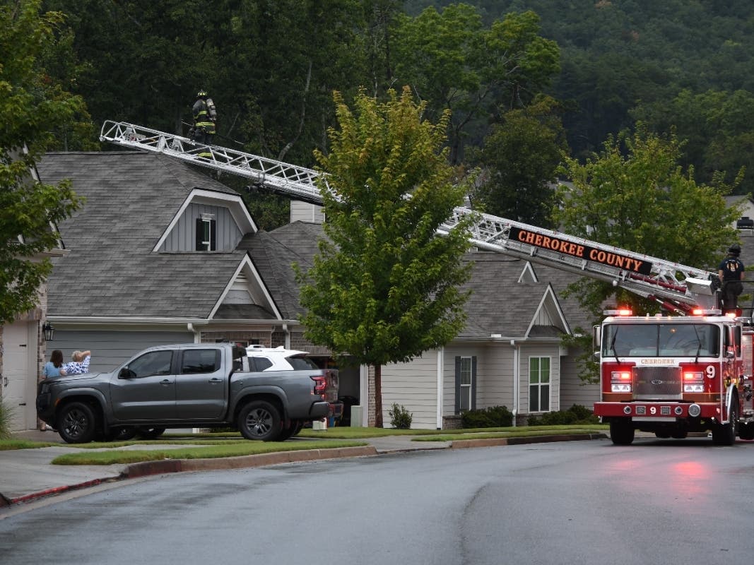 Cherokee County Fire and Emergency Services responds to a Waleska home after lightning struck it around 7:30 a.m. Tuesday.