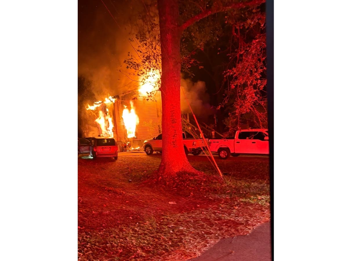 Cherokee County firefighters respond to a massive blaze around 5 a.m. Wednesday at a North Etowah Drive home in Canton.