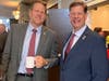 Gov Sununu & Tim McGough chat at Republican Unity Breakfast on 9/15/22 in Concord, NH