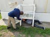 National Grid volunteers painting the steps.