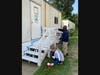 At the Nassau County Family Court program, we caught the National Grid volunteers painting the steps.