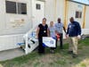 EAC staff Lisa Newman, Senior Director of Behavioral Health Services, with National Grid Volunteers