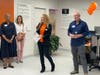 (right side) Anka Badurina, Executive Director of B1C, introduces the exhibit with John Moore, the photographer. 

(left side) Stephanie Thomas, Secretary of the State of CT and John Moore’s wife present. 