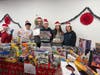 B1C volunteers get ready to distribute toys to hundreds of families.