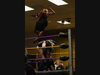 Derrick Conway drops an elbow from the top rope.
