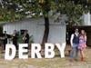 Milton residents Jaime and Brian Duke took a moment to pause before entering the registration barn. A brass serenade of derby tunes and waltzes was performed by members of Cambridge High School band and greeted guests as they arrived at the event.