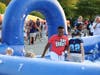 After the parade, guests enjoyed a variety of festival-type activities, including a foam pit, a velcro wall, mechanical bull, inflatables, and more!