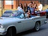 Fulton County School Board Representative Lilly Pozatek (left) rode with Cambridge High School Principal, Ashley Agans, in a classic convertible.