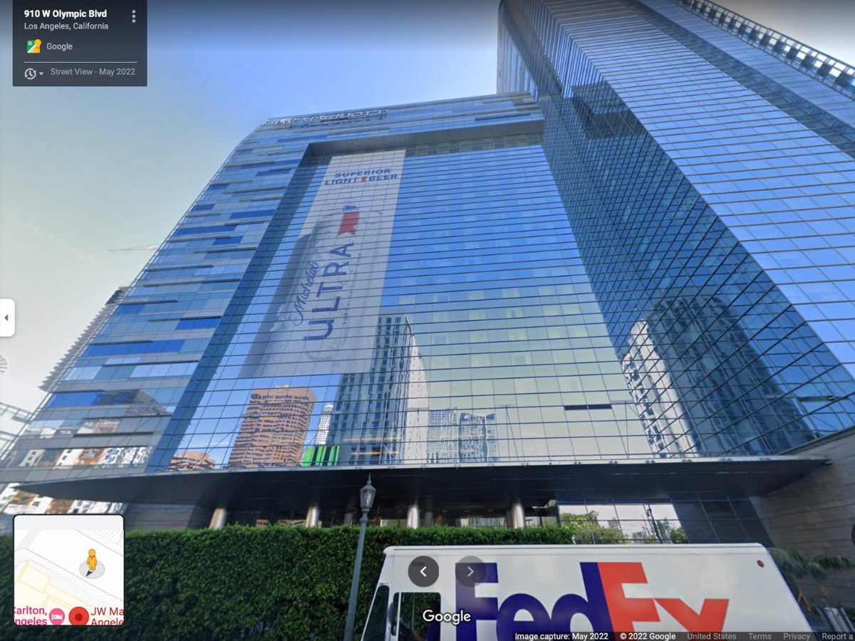 Authorities met the man at the top of the building and immediately took him into custody. 
