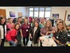 It takes a village. Volunteers for coat distribution support our neighbors in need. Pictured left to right: Cherie Everts, Anita Tung, Dara Diamant, Lillian Churn, Alba, Amanda Parrish Block, Gwen Riddick, Christy Keltz, Ilyse DiChiara, Christine Semcer.