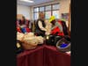 GRACE distributes coats, hats and gloves during their distribution program in October.