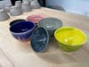 Some of the bowls created by the students in the Ceramics Club.