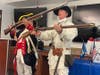 Russ Kaiser and Steve bowman compare Revolutionary War weapons.