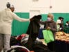 More than 300 Greater Newark community members received a warm coat, baked treats and essential items to help ease the burden of the cold winter months at UCC's “Cookies, Coats and Cocoa” resource distribution.