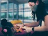 Employee Alissa Conway, Ph.D., BCBA-D, LBS, clinical director of behavior services at NeurAbilities in King of Prussia, interacts with a young patient. 