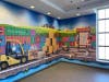 Another wall mural from the playful space in NeurAbilities’ new Chester, Pennsylvania clinic.
