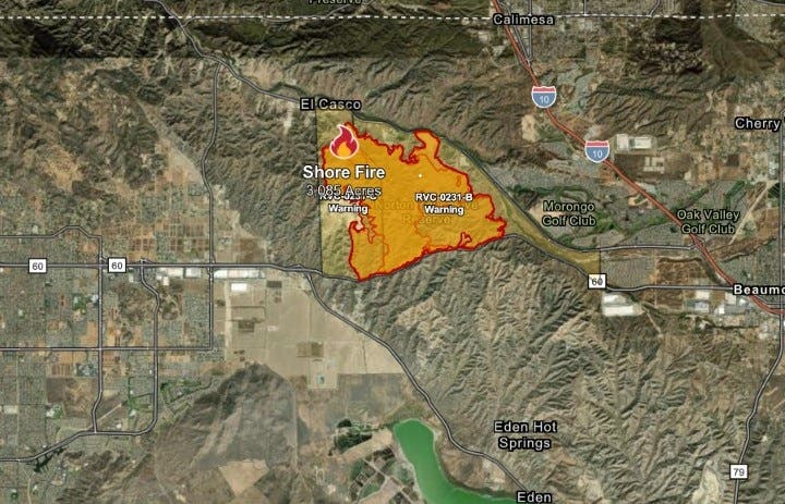 The pink and orange areas show where evacuation orders have been issued. The yellow area shows communities under an evacuation warning. Click the image for the latest. (Cal Fire)