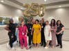 Advanced Pharmacy Solutions and CareOne Wellington Posing Under Balloon Arch in Honor of APS250