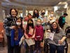 Residents of Juniper Village at Paramus pose for a photo with local Girl Scouts.