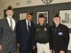 Chad Carmack, Bill Conley, and fellow participants, James and Kirk, including representatives from American Legion Post 10, join in remembrance of POW/MIA service members.