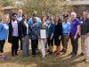 VIPs display Star-C Day proclamation.