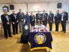 A moment of the ceremony showing all officers involved.