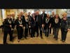 Juniper Village at Paramus resident Marie Dolce poses for a photo with her former group, the New Jersey Choral Society’s, Chanteurs.