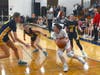 Maine South's Meegan Fahy looks to drive as Anna Rosenberger (left), Paige Simon (beside Rosenberger) and Sidney Rogers (at right) look to defend. 