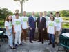 Liberation Programs President & CEO John Hamilton stands with Sen. Richard Blumenthal and Darien High Tudor Singers 