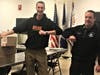 Matt Taylor of RISE (left) delivers care packages to Deputy Chief Ed Podgorski to support Stamford EMS emergency response workers.