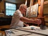 Richard Estes, one of the founders of the Photorealist movement which emerged in America in the late 1960s, at work in his studio.