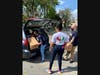 HCC staff and faculty helped to load 700 boxes of perishable and non-perishable food into waiting cars in Bridgeport, CT.