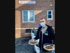 Hubbard drops off bags filled with produce, vegetables and grains and vegan pumpkin pies to the Bridgeport Rescue Mission.