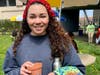 HCC student Jasmine Hamel, a biology major from Fairfield, shows off her painted planting pot at the College’s Earth Day Celebration.