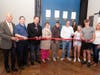 Bill Purcell, Eric McPherson, Bing Carbone, Virginia Harger, John Anglace, Whitney Cabinet Painting Owner Michael Putnam, and his family.
