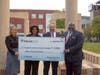 left to right, Kristy Jelenik, Patriot Bank EVP, Chief Compliance, Risk and CRA Officer Judith Corprew, CEO and Patriot Bank President Rob Russell, and HCC CEO Dr. Dwayne Smith.