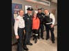 Firefighter Karp alongside Orland Police Officers that raised money for medical expenses and recovery.  