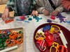 Homemade Play Dough Table: Young children received small gifts of Play Dough to enjoy and take home.