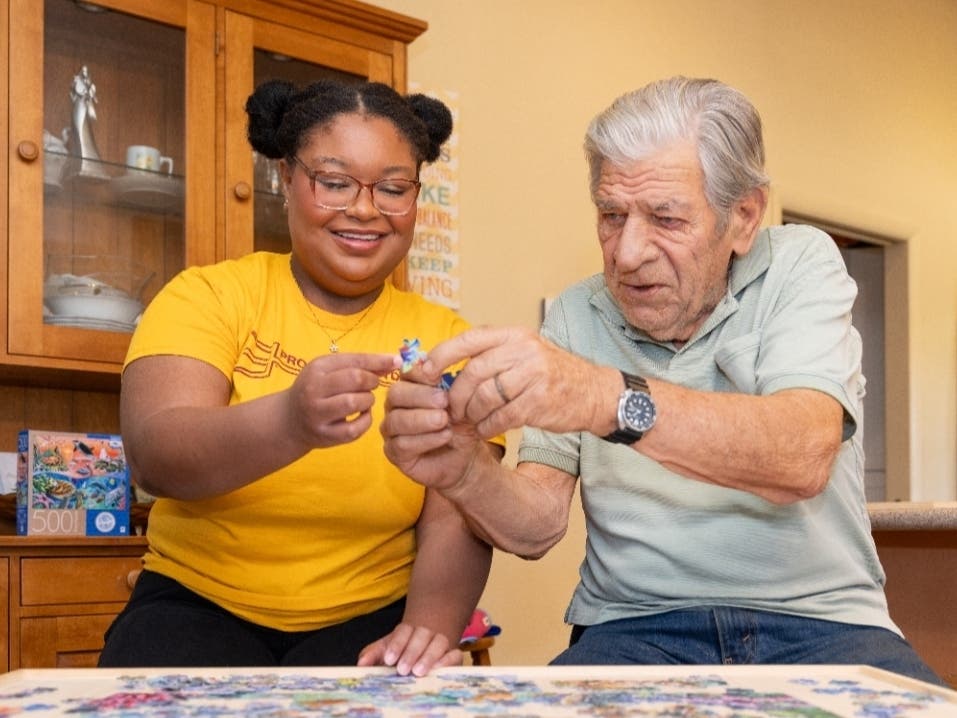 Emily-Jane Crawford and many other ASU students provide joyful connection for people like Bud Addison who are living with dementia.