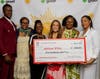 Addison White with Fiserv staff members (left to right) Andre Bryan, Simone Arnold, Yasha Riley, Shonette Paisley and Angela Cheshier