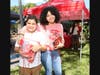 Littles receiving their free supplies from presenting sponsor, Ana G. Méndez University
